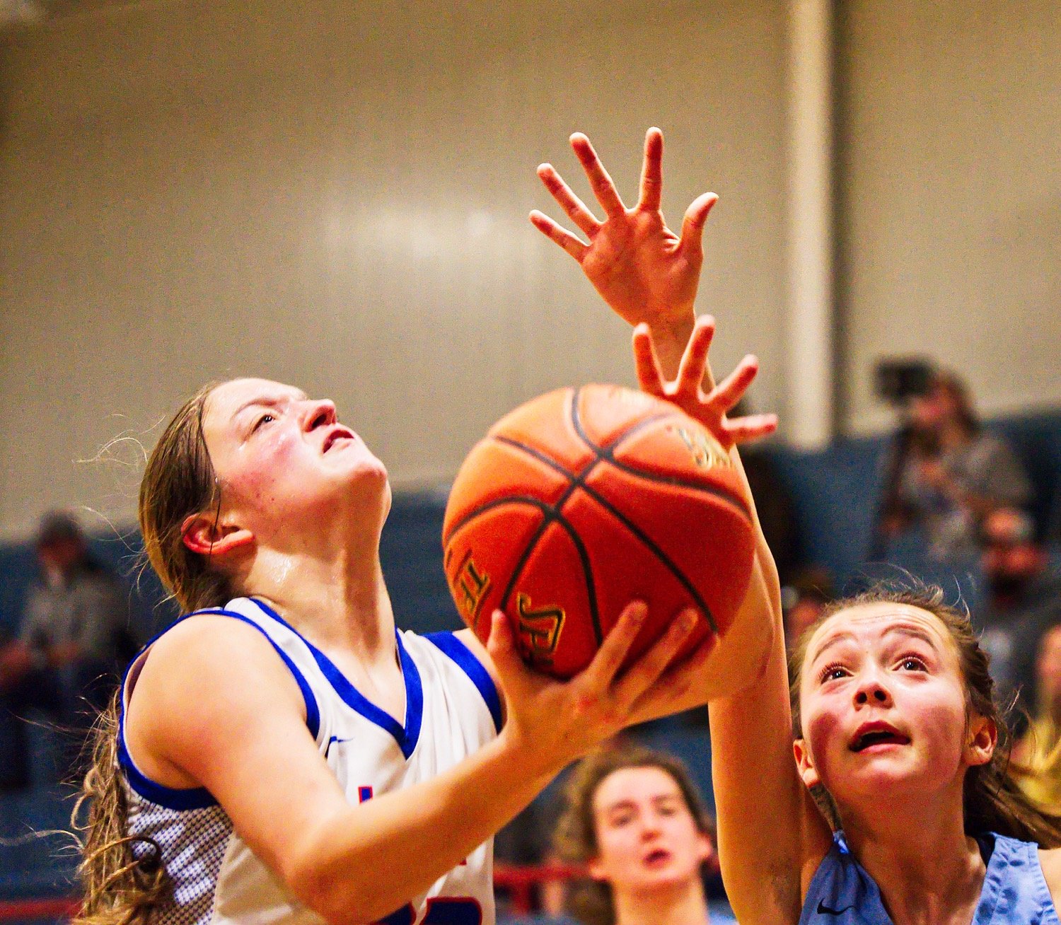 Maddy Pence goes in for a contested layup. [prints are available]
